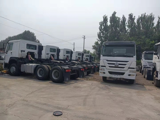 มือสอง Sinotruk HOWO หัวรถบรรทุกแทรกเตอร์ที่มีการรับรอง ISO การชําระเงินที่ปลอดภัย